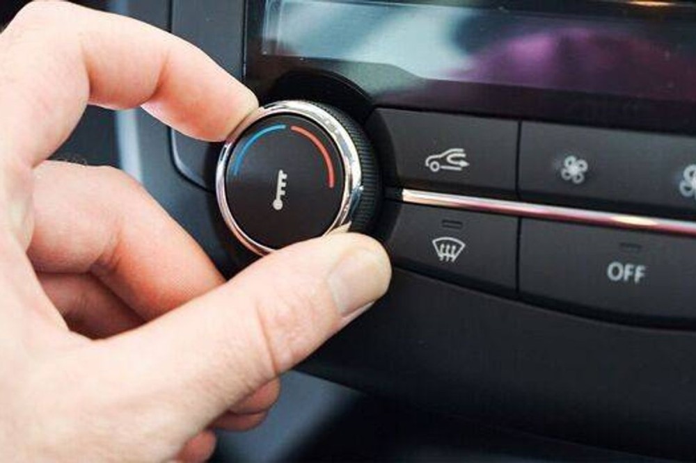 why does car AC turn on with defrost